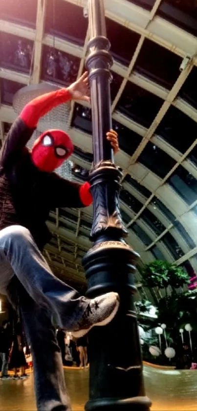 Spider-Man strikes a dynamic pose on a pole, set against an architectural background.