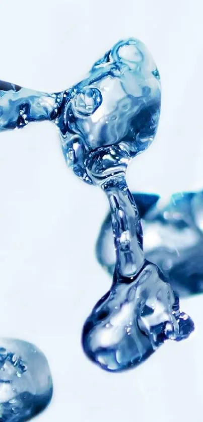 Abstract flow of water captured mid-splash with a light blue background.