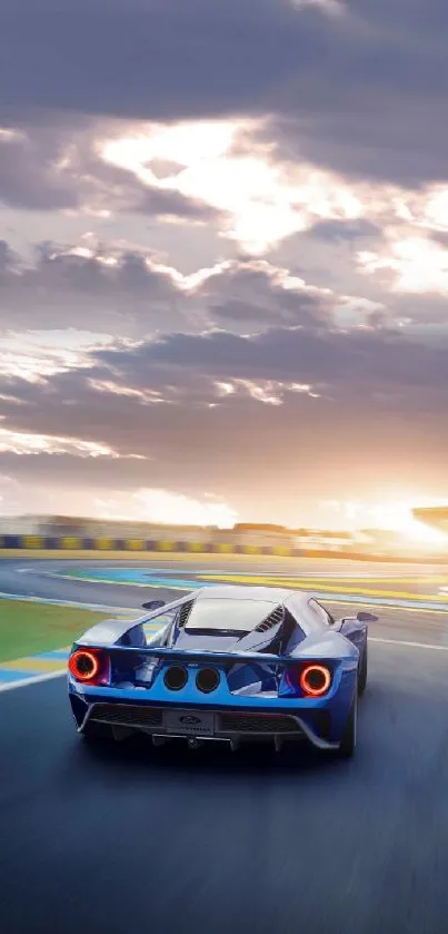 Sleek sports car racing on track at sunset.