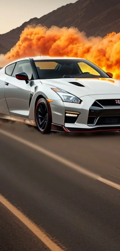 White sports car on road with orange clouds.