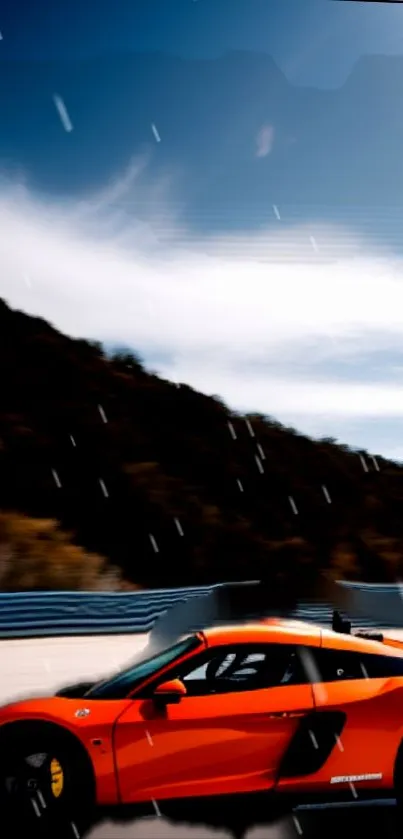 Sleek orange sports car speeding on a scenic road with a vibrant sky.