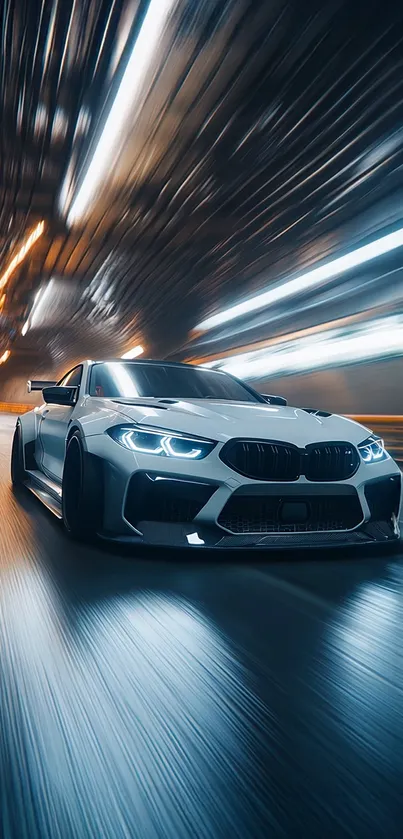A sleek sports car speeds through a tunnel at night, displaying dynamic motion blur.