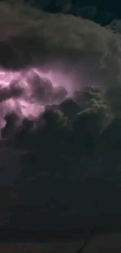 Dynamic storm clouds with lightning at night.