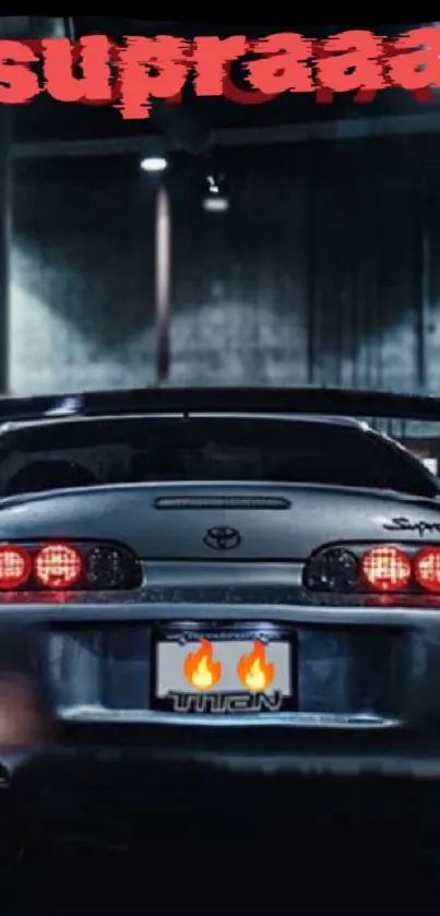 Supra car on urban nighttime street with glowing tail lights.