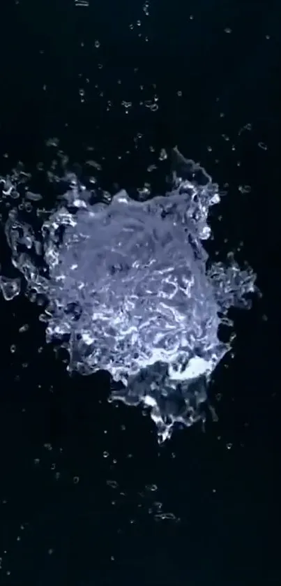 Dynamic water splash on dark background wallpaper.