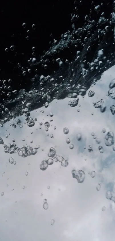 Water splash against a dark sky with bubbles in motion.