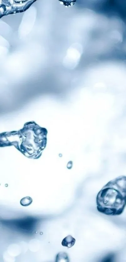 Dynamic splash of water against blue background wallpaper.