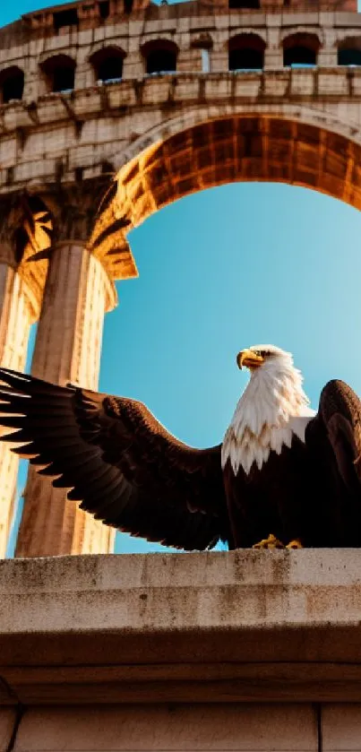 Eagle perched under ancient arch against blue sky.