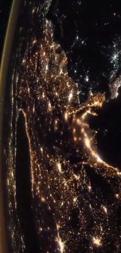 A stunning view of Earth at night from space, glowing with city lights.