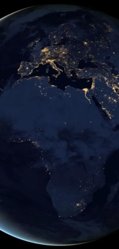 Earth at night with illuminated continents as seen from space.