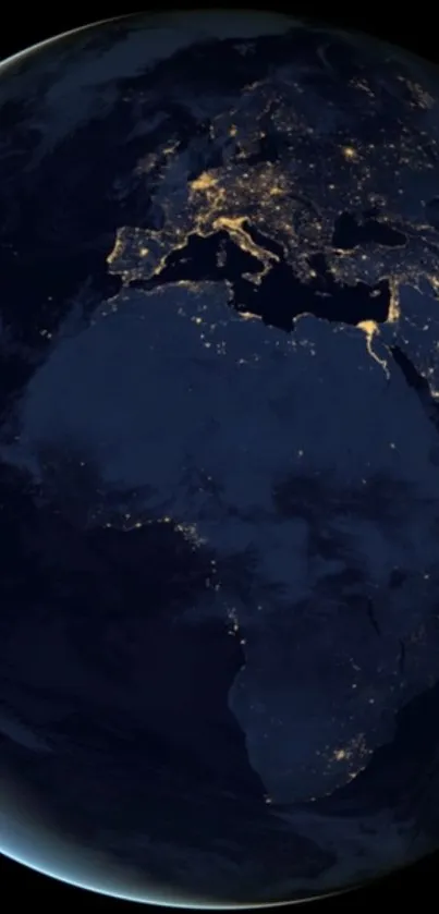 Earth seen at night with illuminated cities.