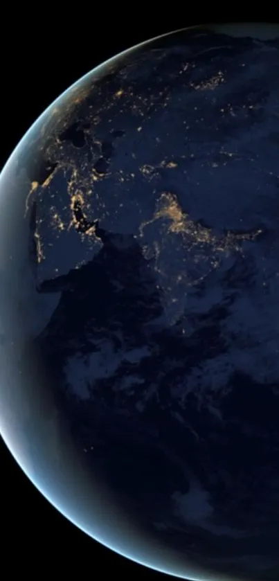 Earth's night view from space with illuminated city lights.