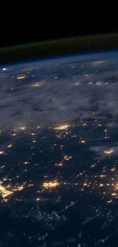 Earth from space showing lights on cities at night.