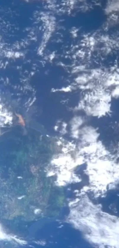 Earth from space with clouds and blue ocean view.