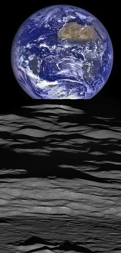 Earth rising above the moon against a stark black sky.