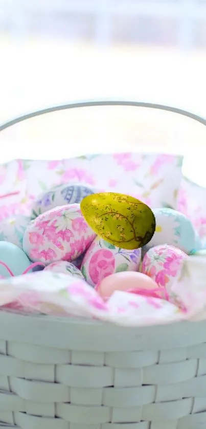 Pastel Easter basket with colorful decorated eggs.