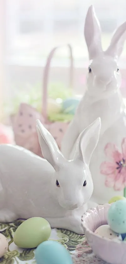 White ceramic bunnies with pastel eggs in an Easter theme setting.