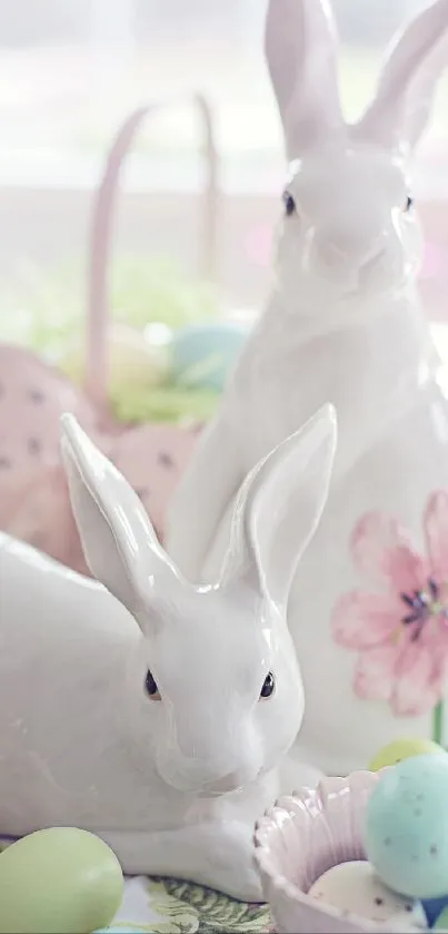 Ceramic Easter bunnies surrounded by pastel eggs and flowers.