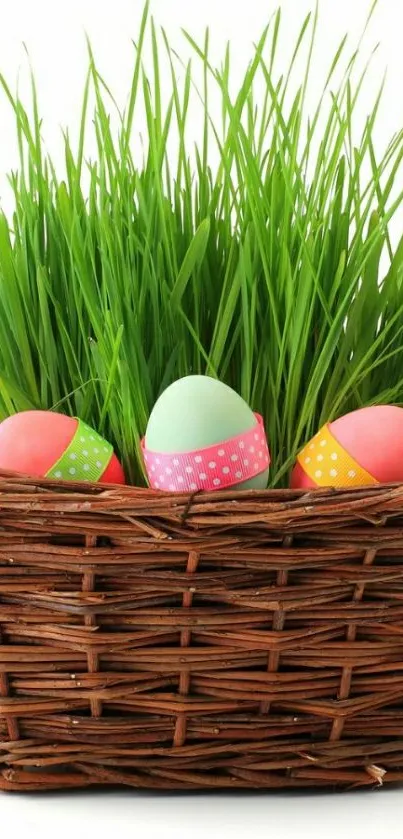 Colorful Easter eggs in a green grass-filled basket.