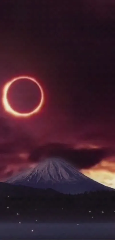 Solar eclipse with majestic mountain scenery and dark purple sky.