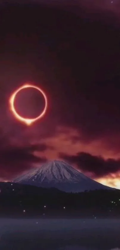 Solar eclipse over mountain peak under a starry sky, creating a dark majestic scene.