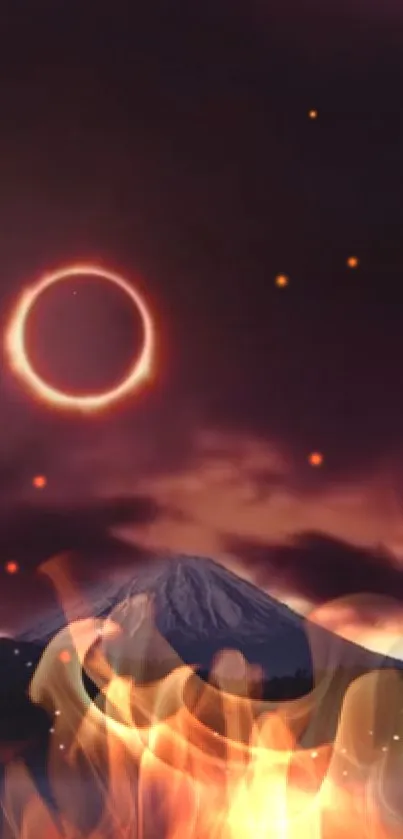 Eclipse over mountain with flames and dark sky.