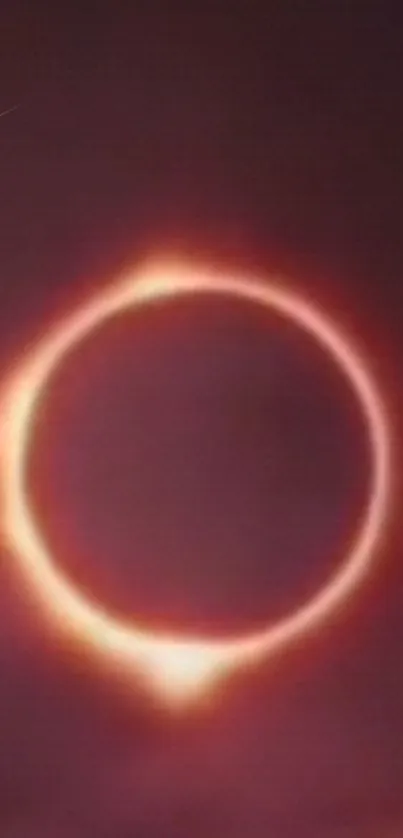 Dark sky eclipse ring wallpaper with glowing effect.