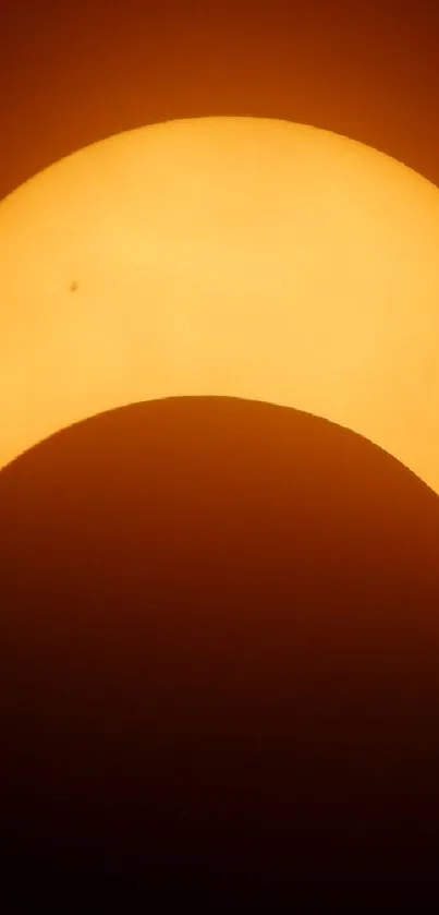 Vibrant mobile wallpaper of a solar eclipse with a distinct sun and moon alignment silhouette.