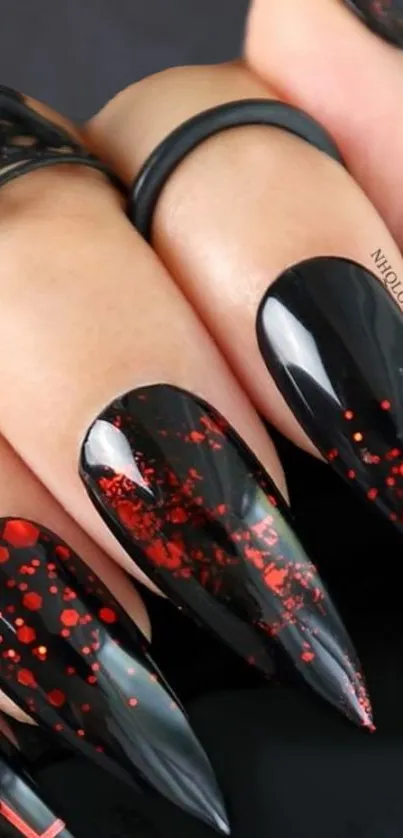 Stylish black nails with red accents wallpaper.