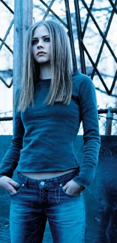 Woman in blue jeans and top, urban background.