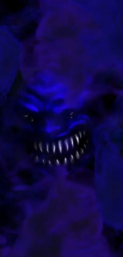 Blue smoky monster with sharp teeth in darkness.