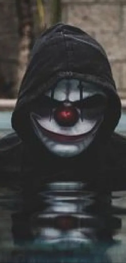 Hooded clown face emerging from dark water.