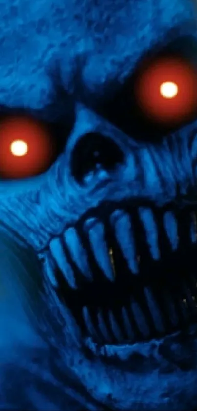 A blue skull with glowing red eyes in dark ambiance.