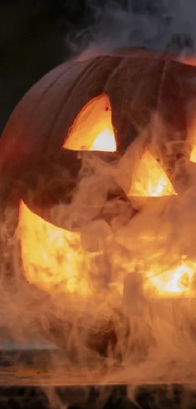 Eerie glowing jack-o'-lantern with spooky smoke on a dark background.