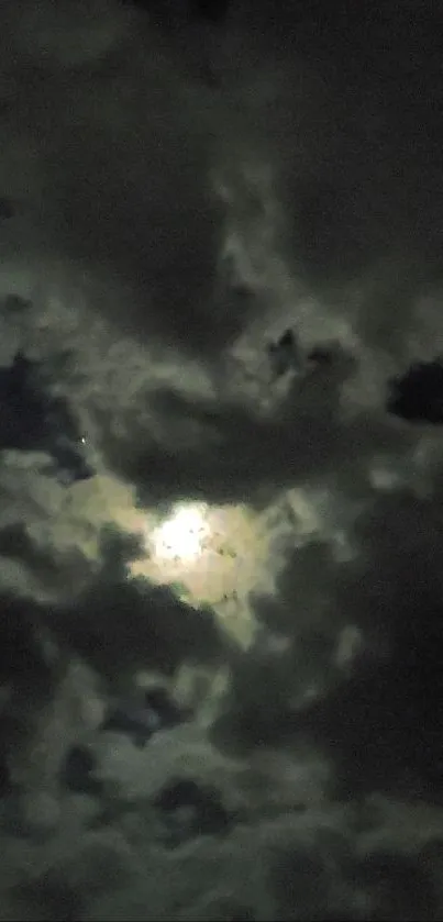 Eerie moonlit clouds blanketing the night sky, creating a mysterious ambiance.