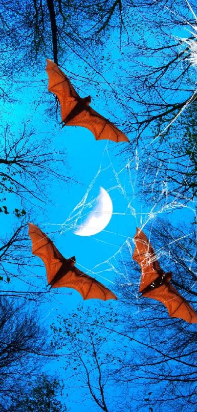 Bats flying under a crescent moon in a blue night sky.