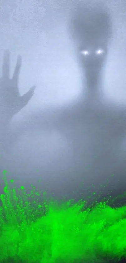 Eerie foggy wallpaper with glowing green hands.