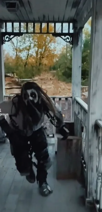 Eerie masked figure on a creepy porch surrounded by autumn scenery.