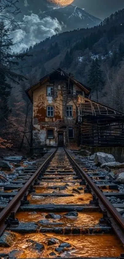 Abandoned house by a railway at dusk with a moonlit mountain backdrop.