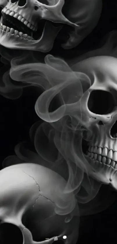 Skulls with swirling smoke in a dark background.