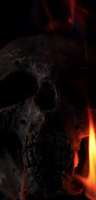 Dark skull engulfed in flames mobile wallpaper.