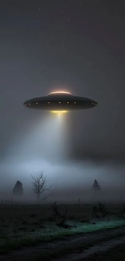 Dark night sky with glowing UFO and misty landscape.