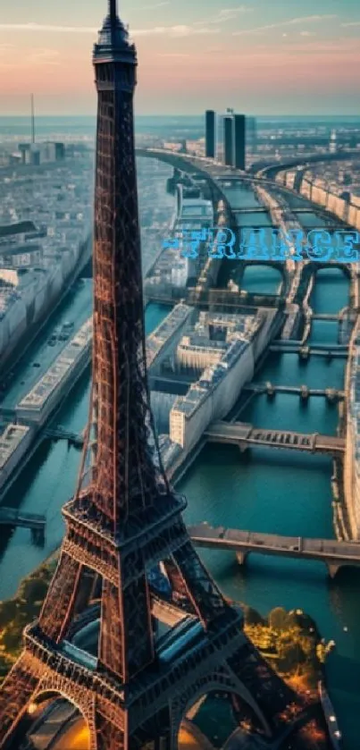 Aerial view of the Eiffel Tower at sunset with Paris skyline.