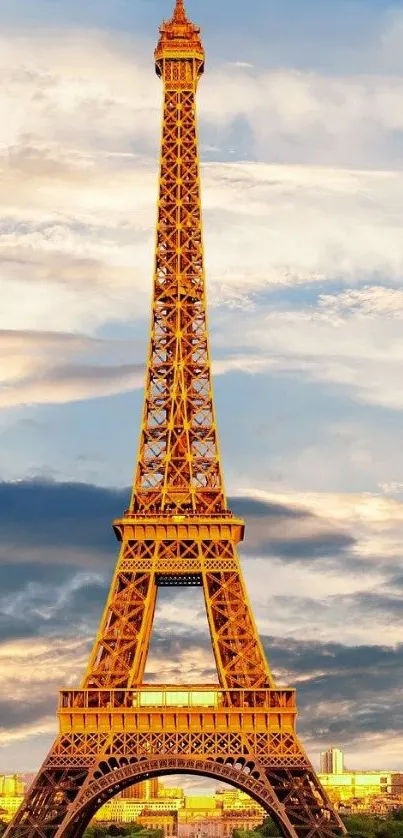 Eiffel Tower against sunset sky with vibrant clouds.