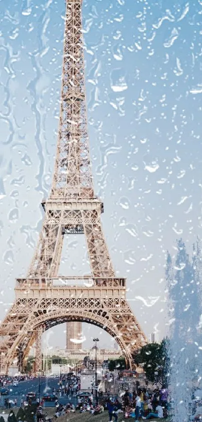 Wallpaper of the Eiffel Tower with raindrop overlay under a bright blue sky.