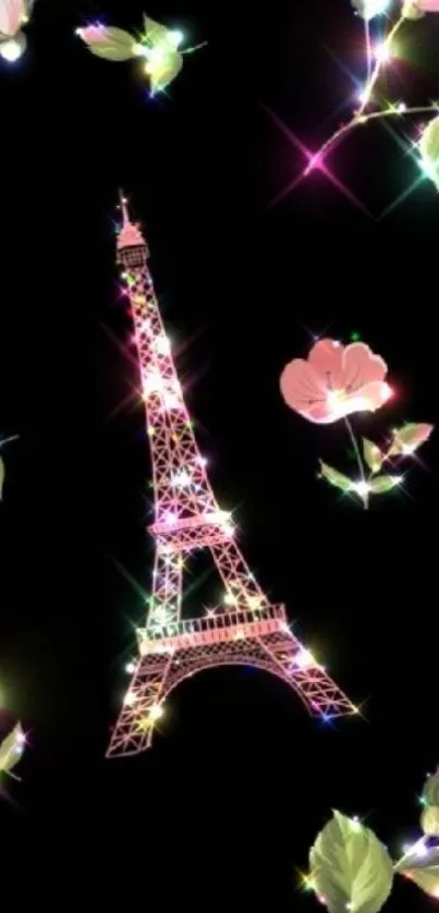 Glowing Eiffel Tower with flowers on black background.