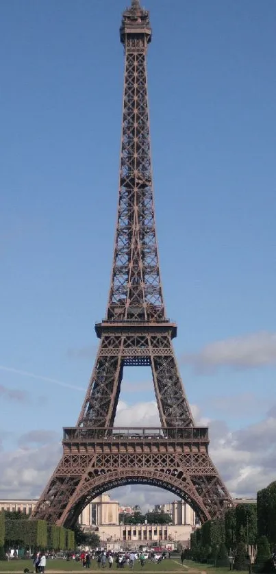 Eiffel Tower under a bright blue sky, ideal for mobile wallpaper.