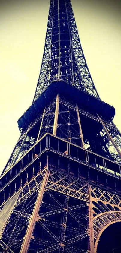 Vintage Eiffel Tower with blue tones in Paris, ideal for mobile wallpaper.