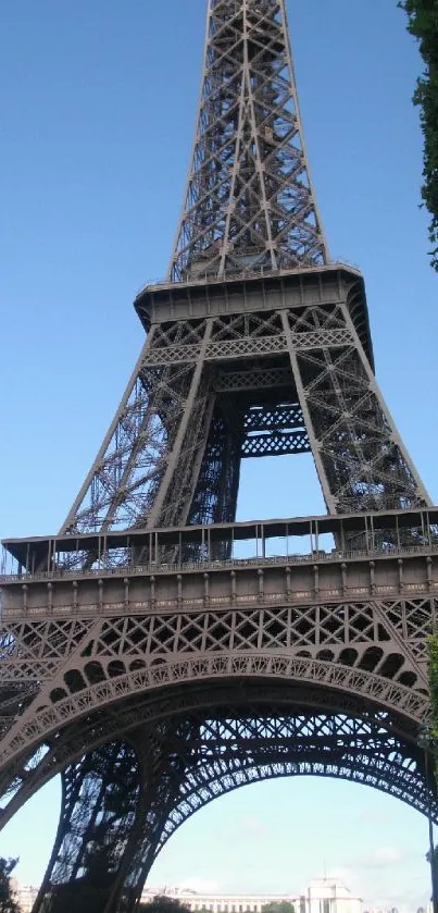 Eiffel Tower under a clear blue sky, perfect for mobile wallpaper.