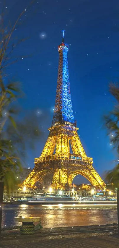 Beautiful night view of Eiffel Tower glowing with vibrant golden lights.